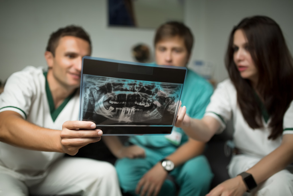 dentists with x-ray image